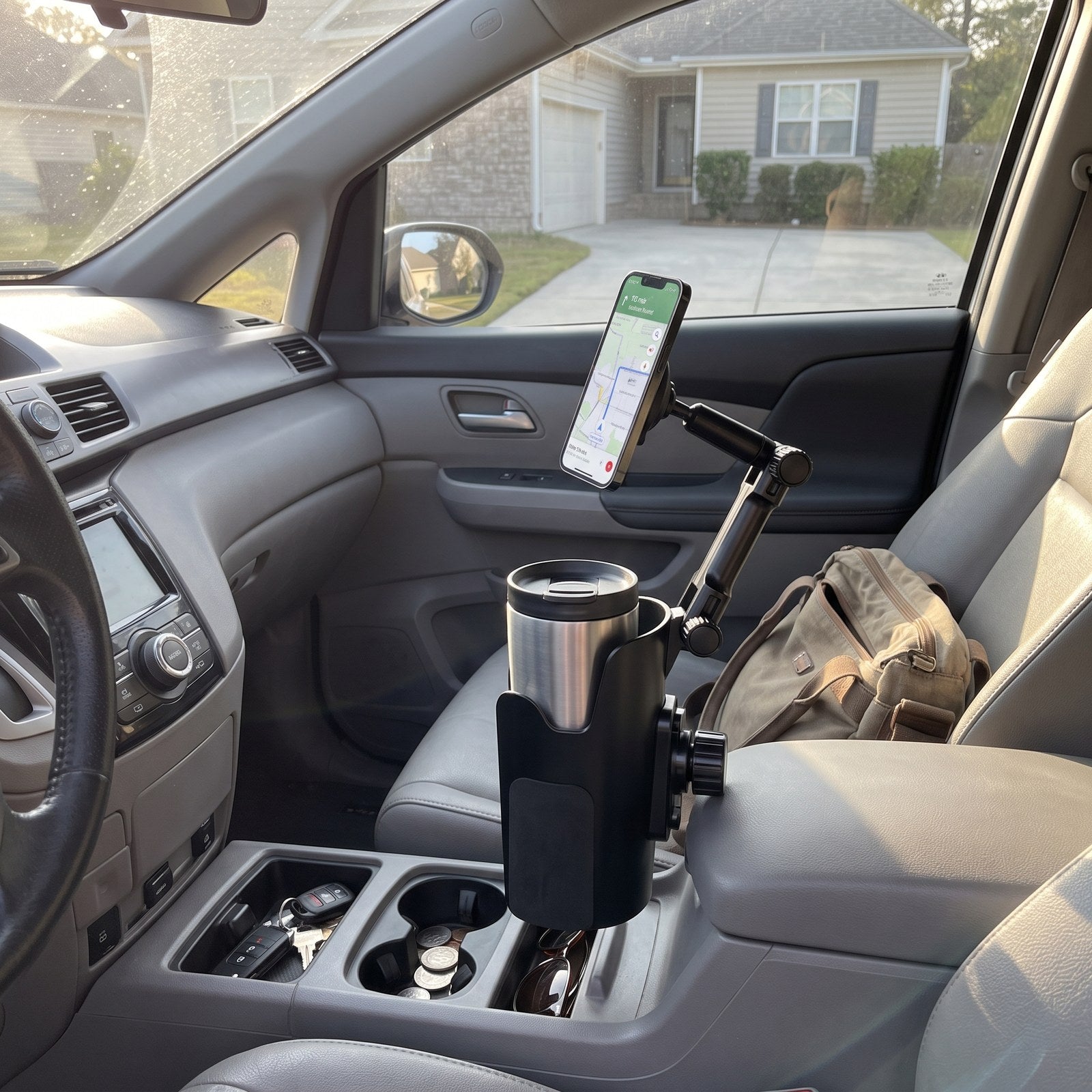 RoadMate phone and drink setup before a morning trip