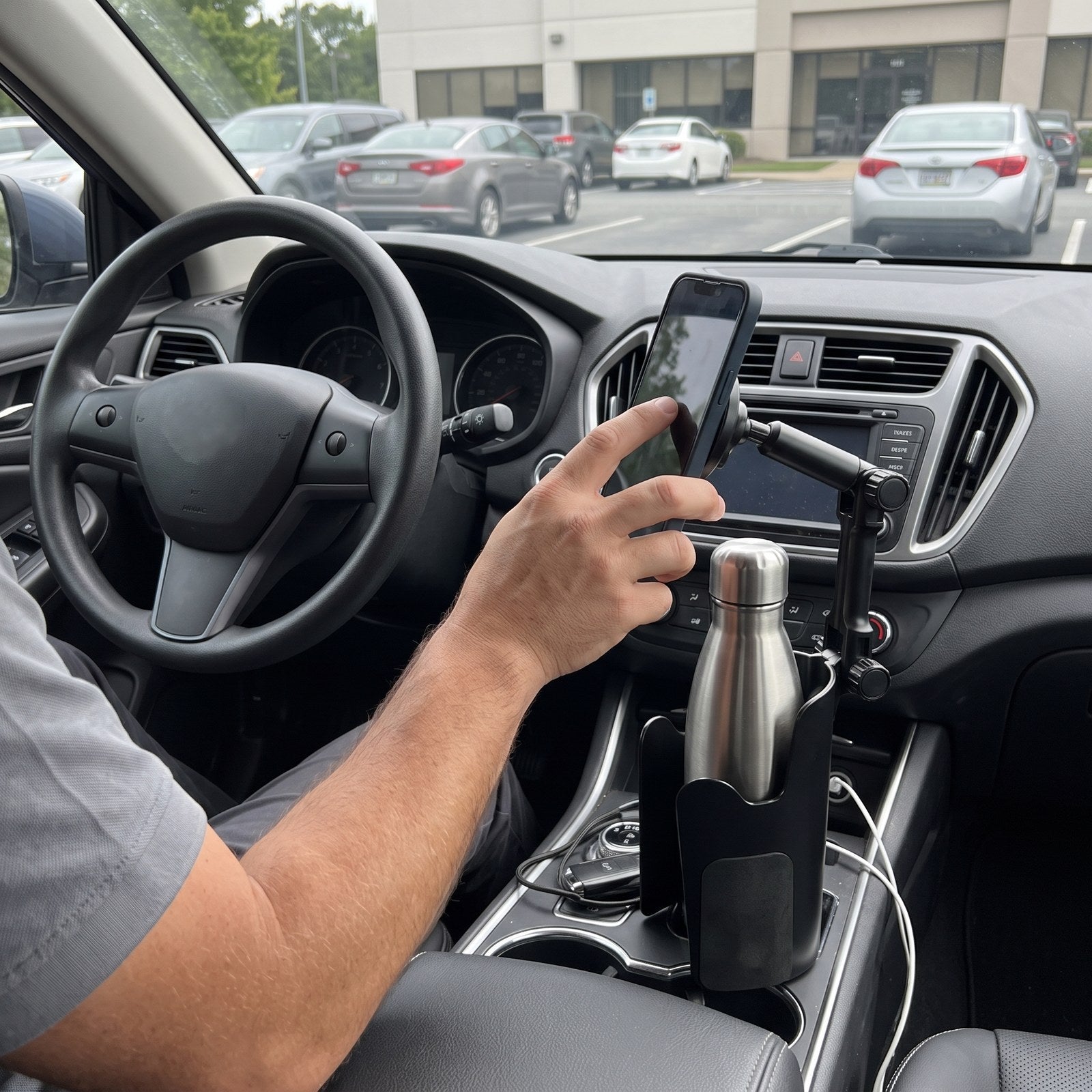 Daniel M. with RoadMate in a parked car
