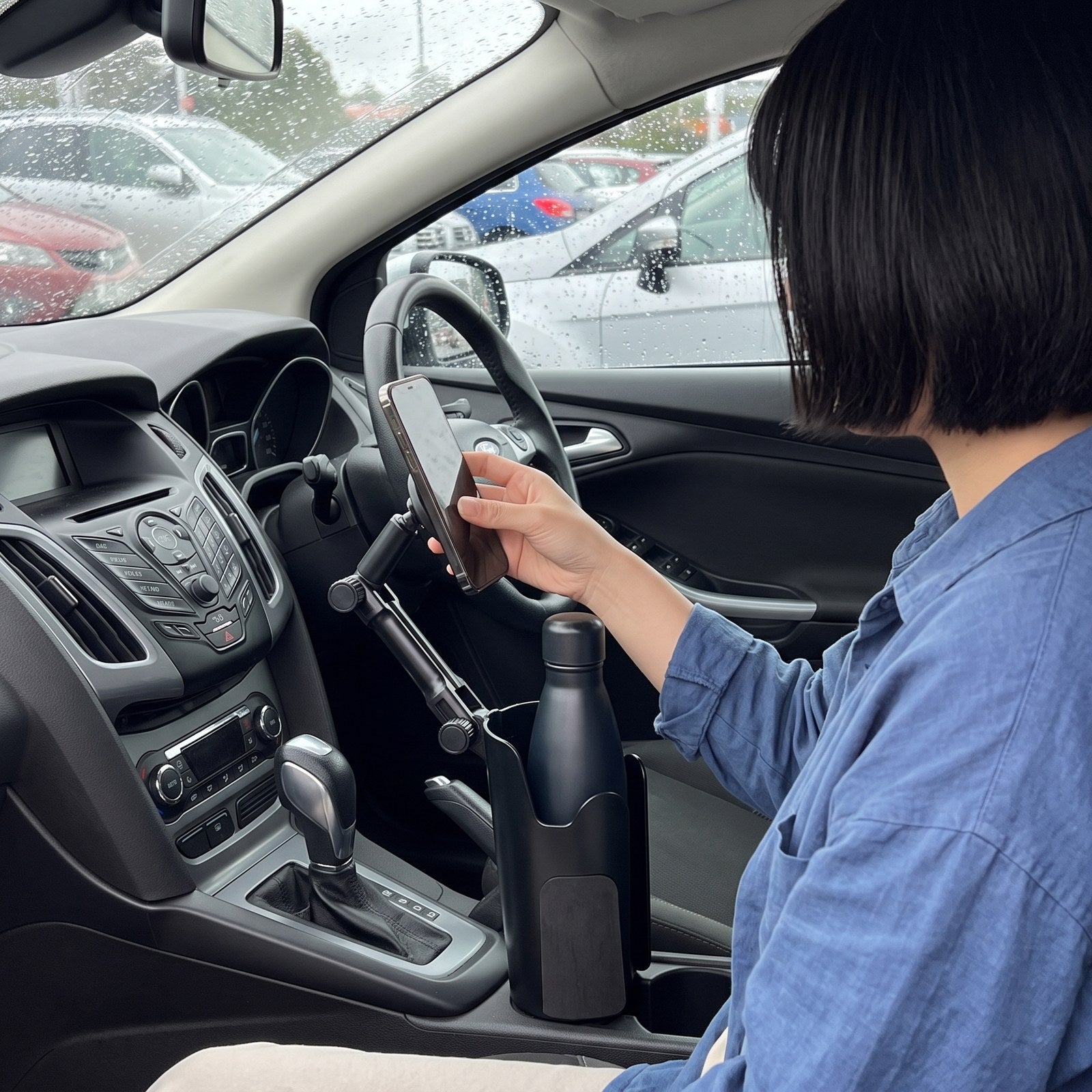 Olivia K. with RoadMate in a parked car